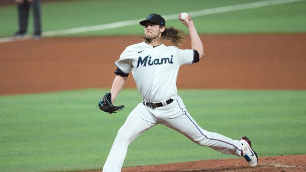 Steven Okert pitches